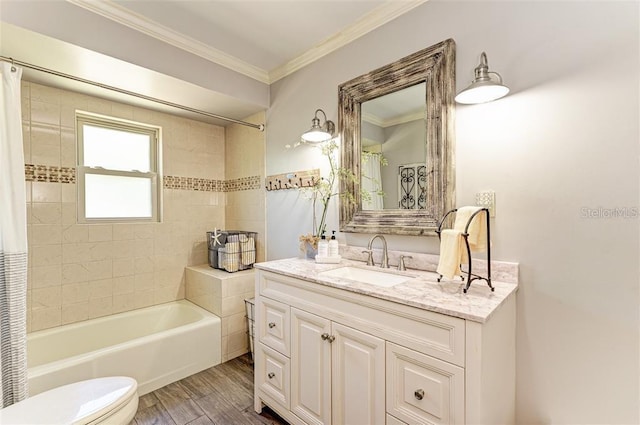 full bathroom with hardwood / wood-style floors, vanity, toilet, ornamental molding, and shower / tub combo