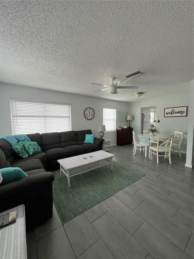 living room with ceiling fan