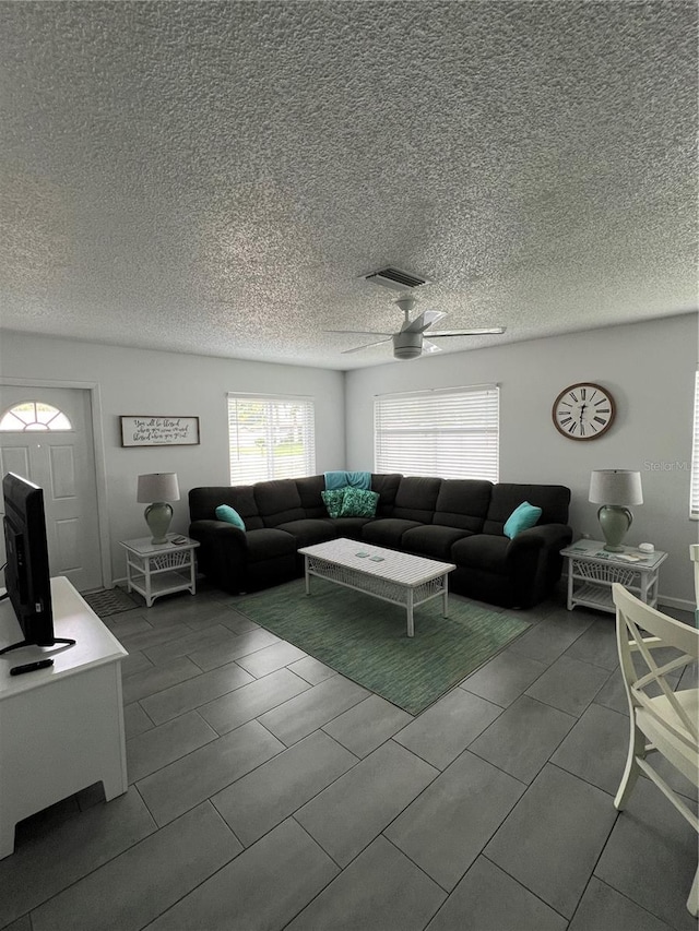 living room featuring ceiling fan