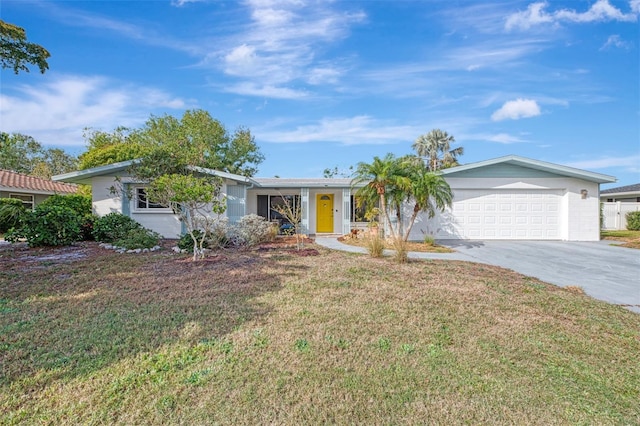 ranch-style home featuring a front yard and a garage