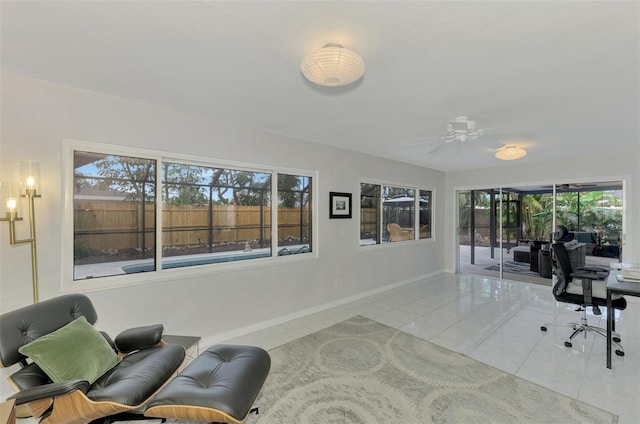 office area featuring ceiling fan and light tile patterned flooring