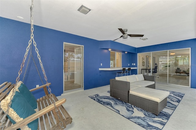 view of patio featuring ceiling fan