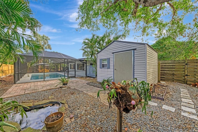 view of outdoor structure with a fenced in pool