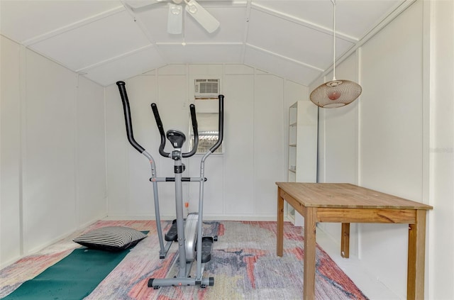 workout room with ceiling fan and lofted ceiling