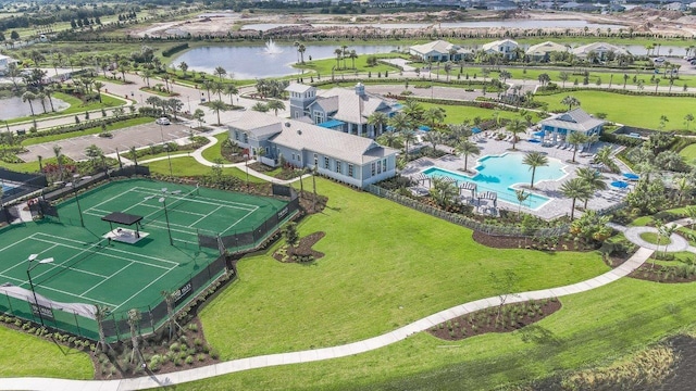 birds eye view of property with a water view