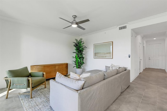 living room with ceiling fan and crown molding