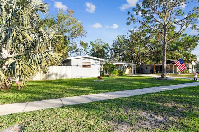 view of front facade with a front lawn