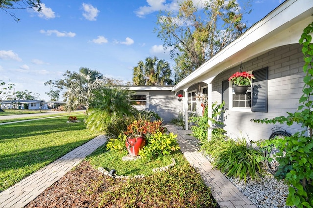 exterior space with a lawn