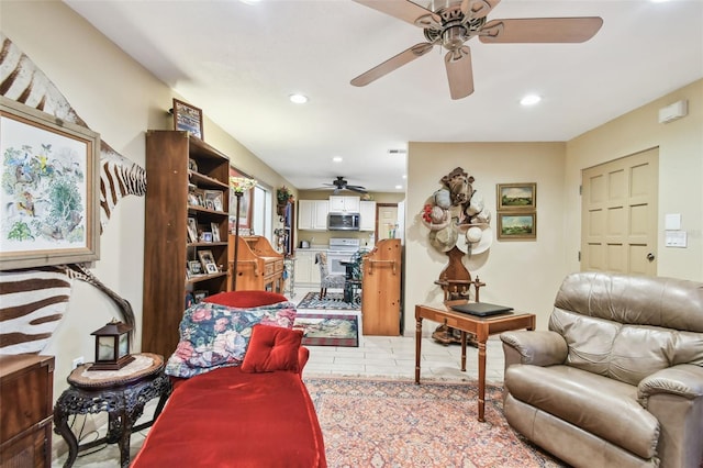 living room featuring ceiling fan