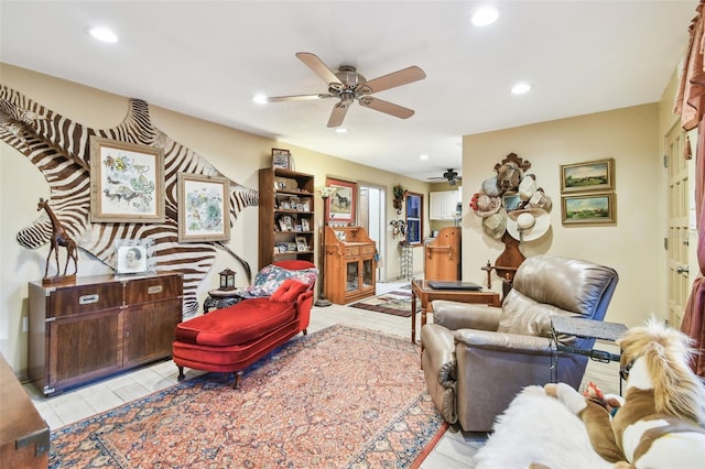 living room featuring ceiling fan