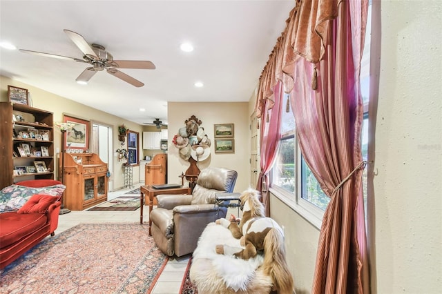 living room featuring ceiling fan