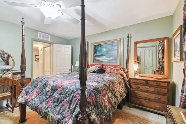 bedroom featuring ceiling fan and a closet