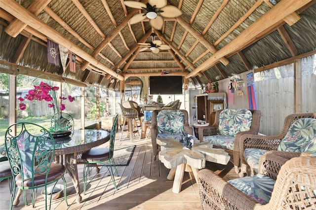 interior space featuring vaulted ceiling and ceiling fan