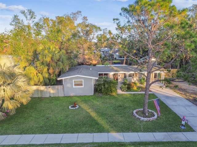 view of front of home with a front lawn