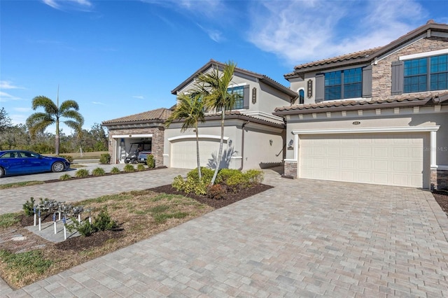 mediterranean / spanish-style home featuring a garage