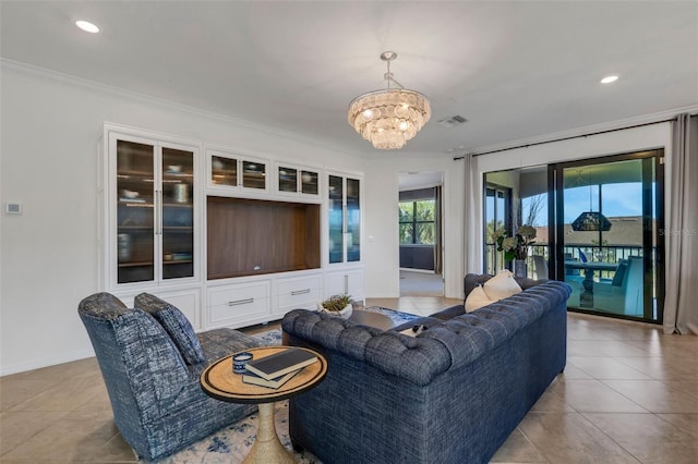 living room featuring light tile patterned floors, crown molding, and a chandelier