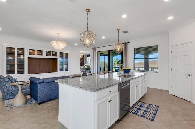 kitchen featuring stainless steel dishwasher, sink, white cabinetry, a kitchen island with sink, and light stone countertops