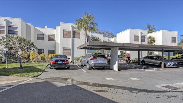 view of car parking with a carport