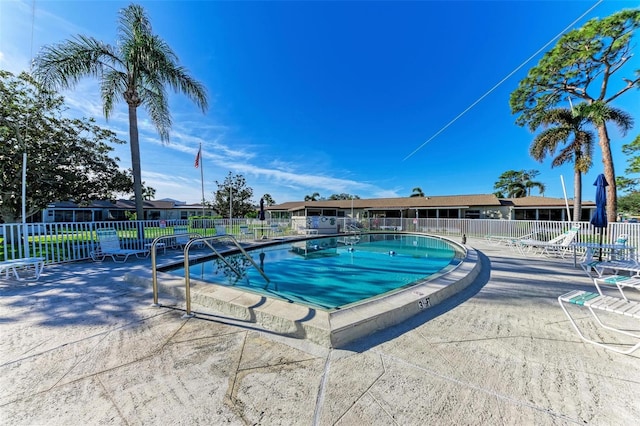 view of pool featuring a patio