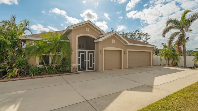 mediterranean / spanish-style house featuring a garage