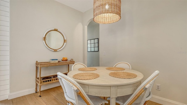 dining area with light hardwood / wood-style floors