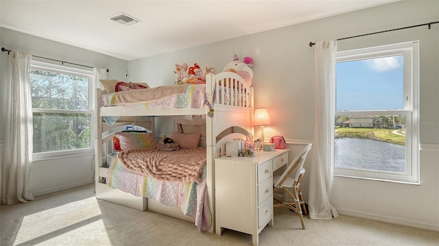 bedroom with light colored carpet