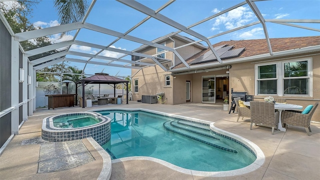 view of pool with a gazebo, an in ground hot tub, and a patio