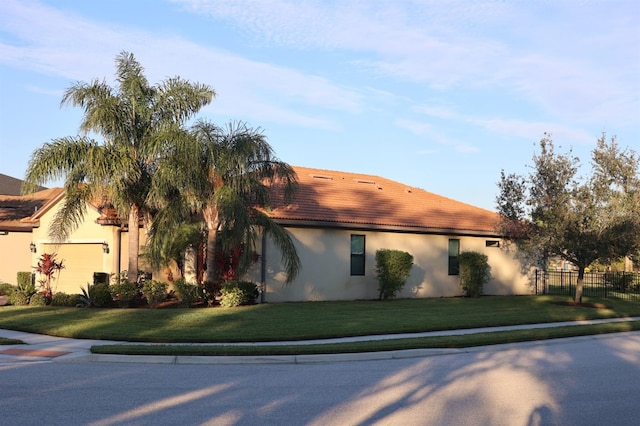 view of property exterior featuring a yard