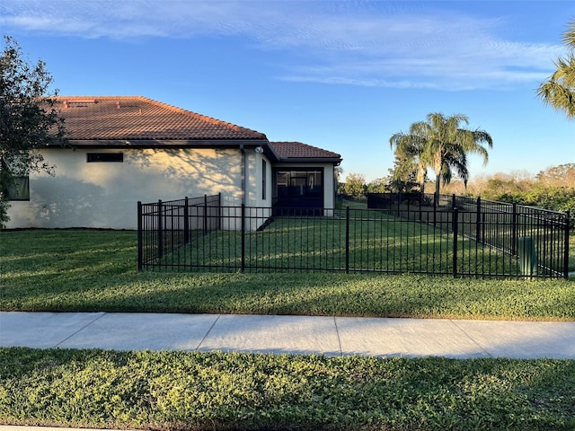 view of property exterior featuring a lawn