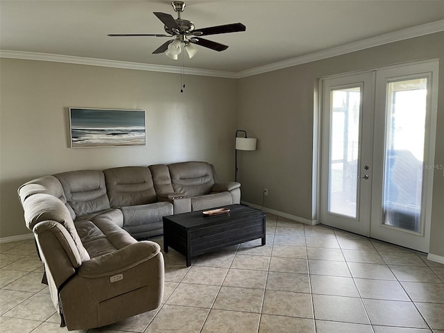 living room featuring french doors, light tile patterned floors, and crown molding