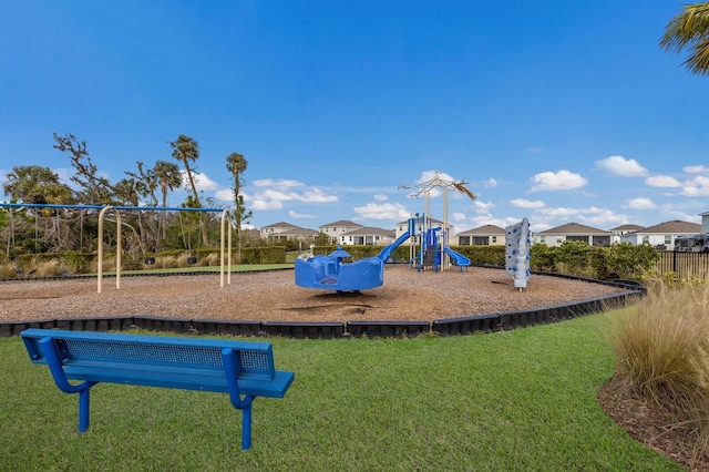 view of playground with a yard