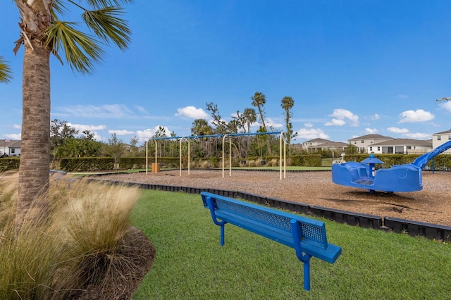 view of playground featuring a lawn