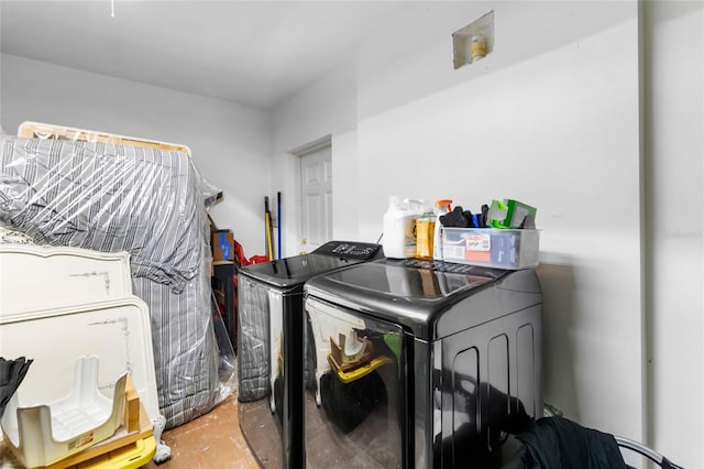 laundry room with separate washer and dryer