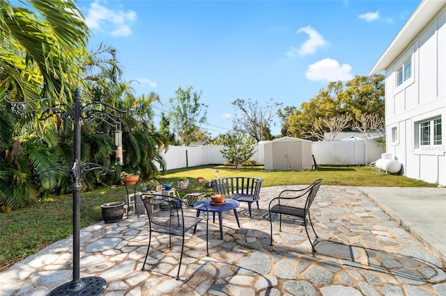 view of patio with a shed