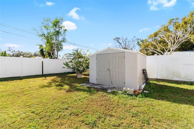 view of outdoor structure with a lawn