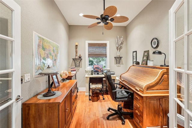 office area with ceiling fan and light wood-type flooring