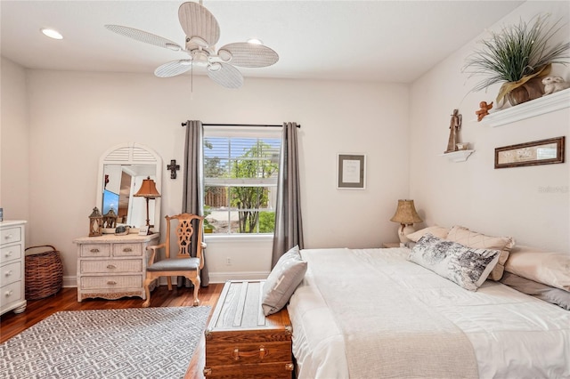 bedroom featuring wood-type flooring and ceiling fan