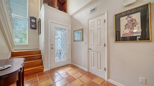 foyer entrance featuring light tile patterned floors