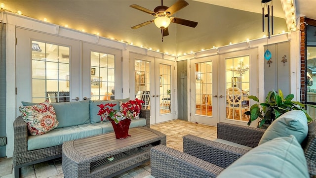 sunroom featuring french doors and ceiling fan