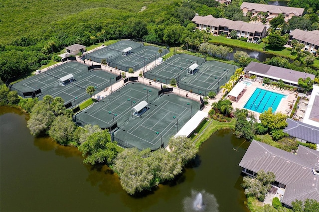 birds eye view of property featuring a water view