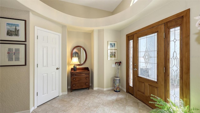 entryway featuring light tile patterned floors