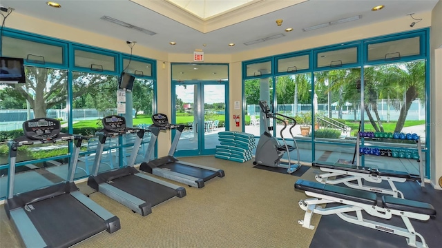 exercise room with french doors and carpet floors