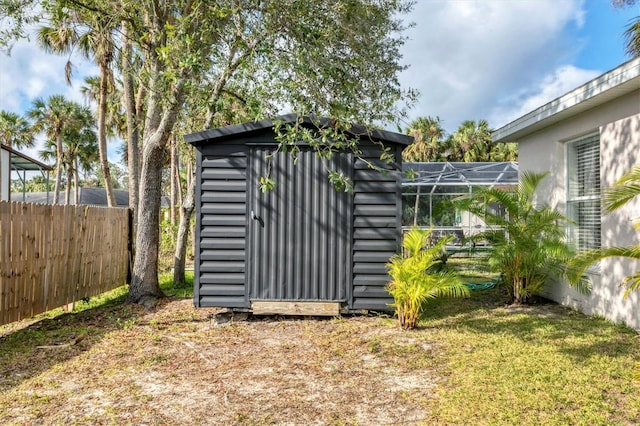 view of outdoor structure featuring a yard