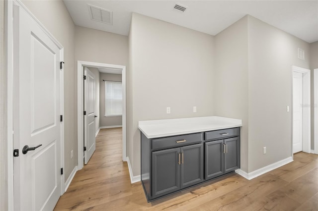 corridor featuring light hardwood / wood-style floors