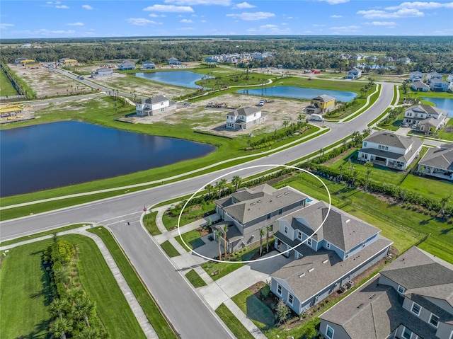 drone / aerial view featuring a water view