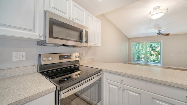 kitchen featuring white cabinets, appliances with stainless steel finishes, and ceiling fan