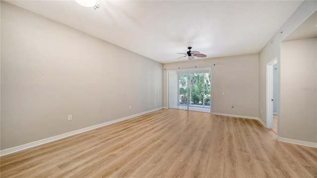 empty room featuring ceiling fan and light hardwood / wood-style flooring