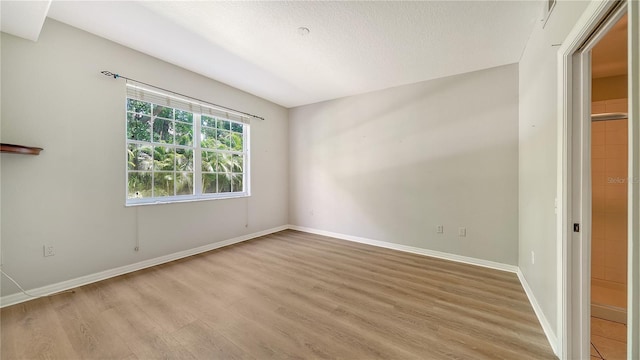 unfurnished bedroom with light hardwood / wood-style floors