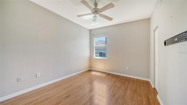 spare room with ceiling fan and light hardwood / wood-style floors