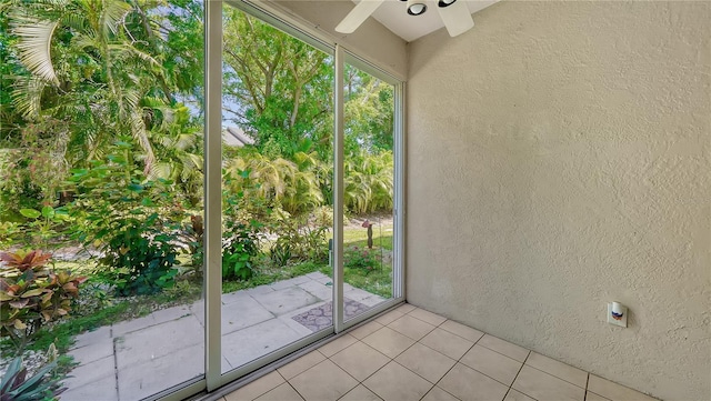 doorway featuring light tile patterned floors